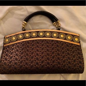 Snap woven clutch bag